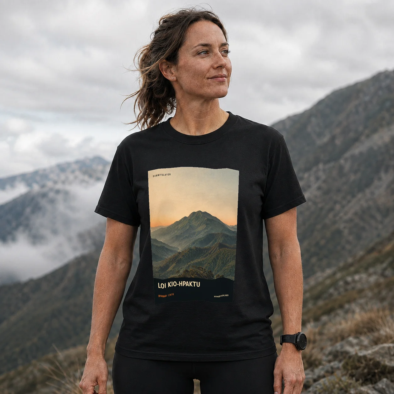 Black LOI KIO-HPAKTU T-shirt front with mountain artwork