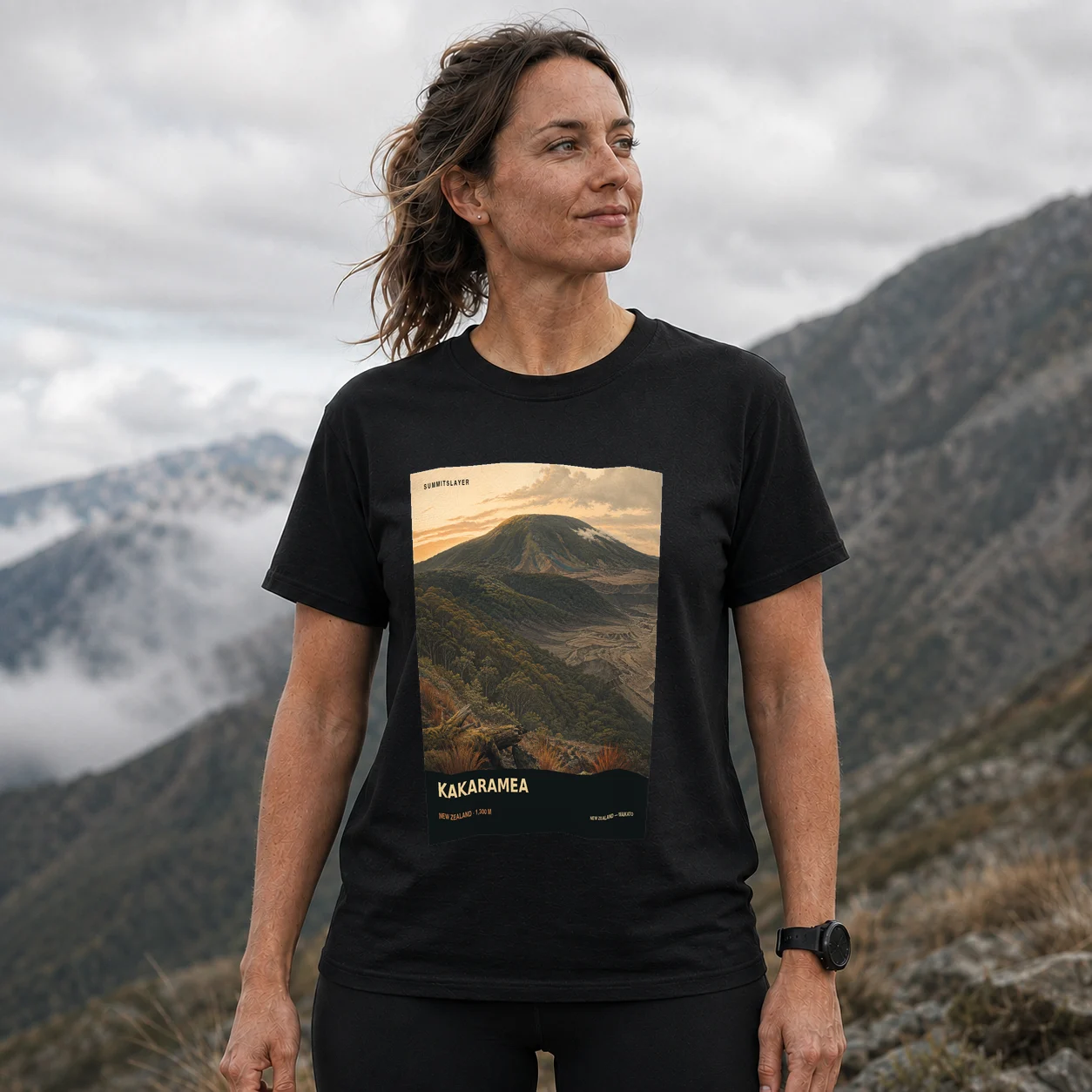 Black KAKARAMEA T-shirt front with mountain artwork