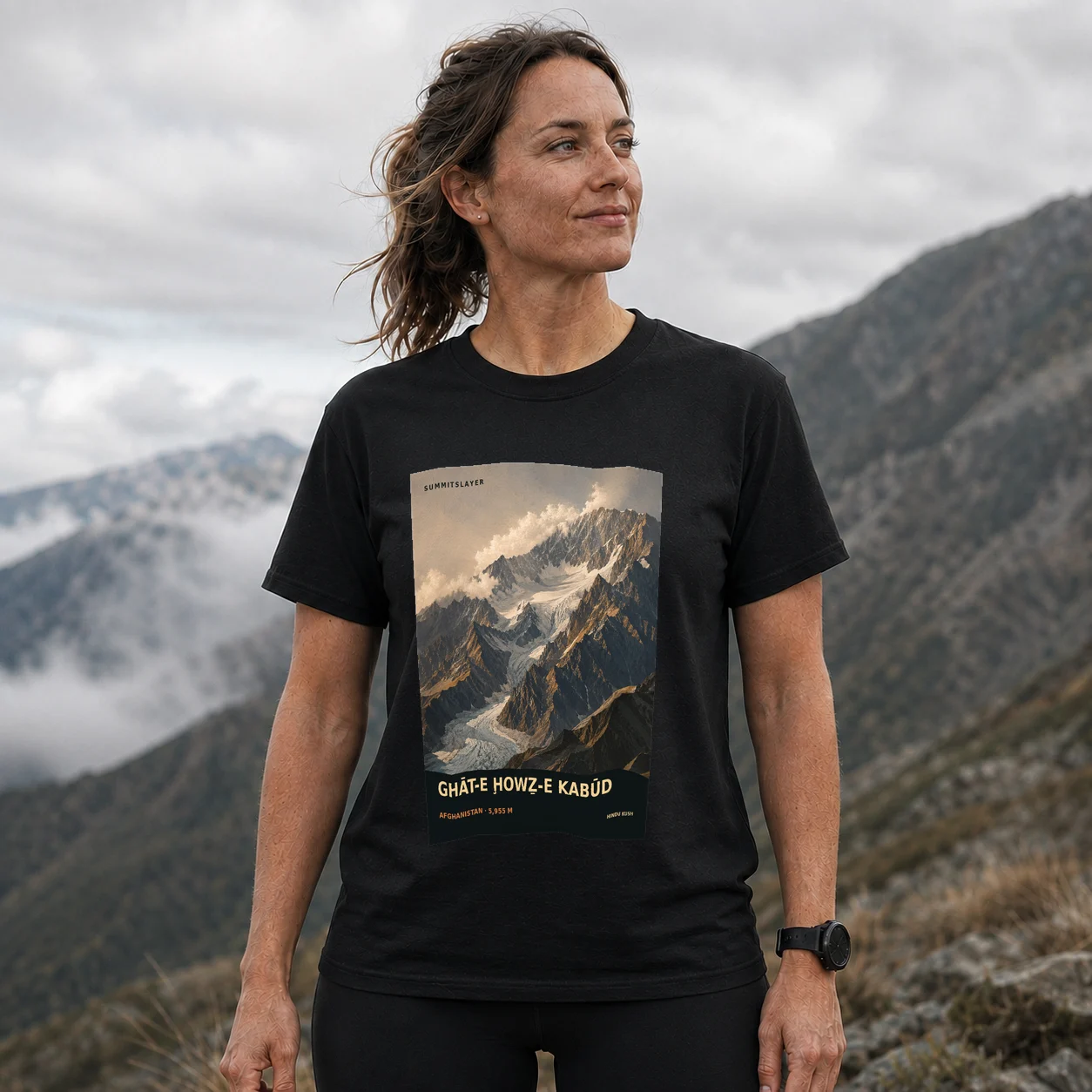 Black Ghāt-e Ḩowẕ-e Kabūd T-shirt front with mountain artwork