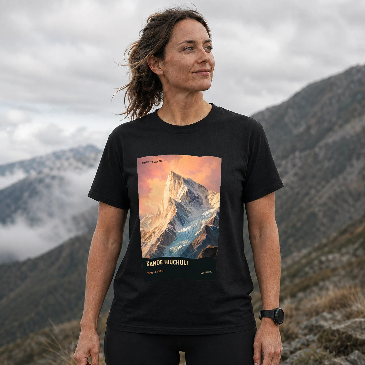 Black Kā̃de Hiū Chuli̇̄ T-shirt front with mountain artwork