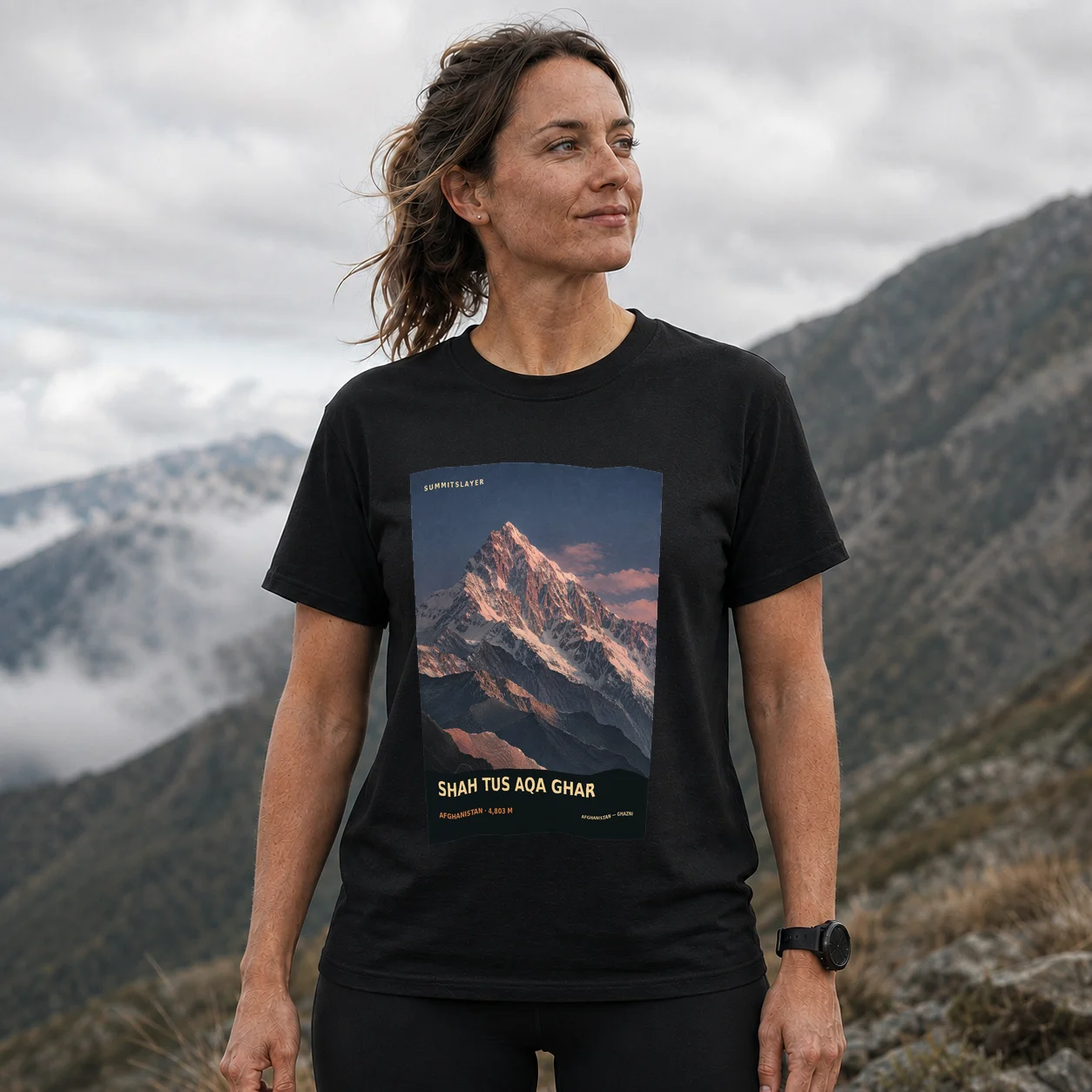 Black Shāh Ţūs Āqā Ghar T-shirt front with mountain artwork