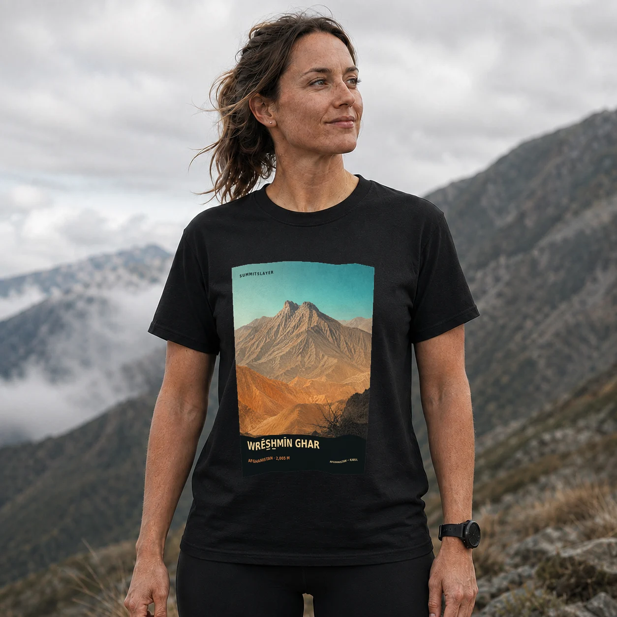 Black Wrēs̲h̲mīn Ghar T-shirt front with mountain artwork