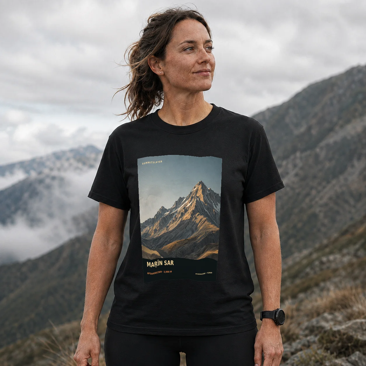 Black Maṟīn Sar T-shirt front with mountain artwork