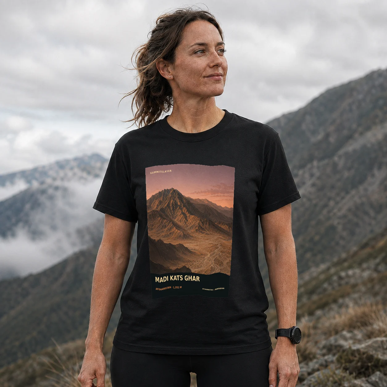 Black Mādī Kats Ghar T-shirt front with mountain artwork