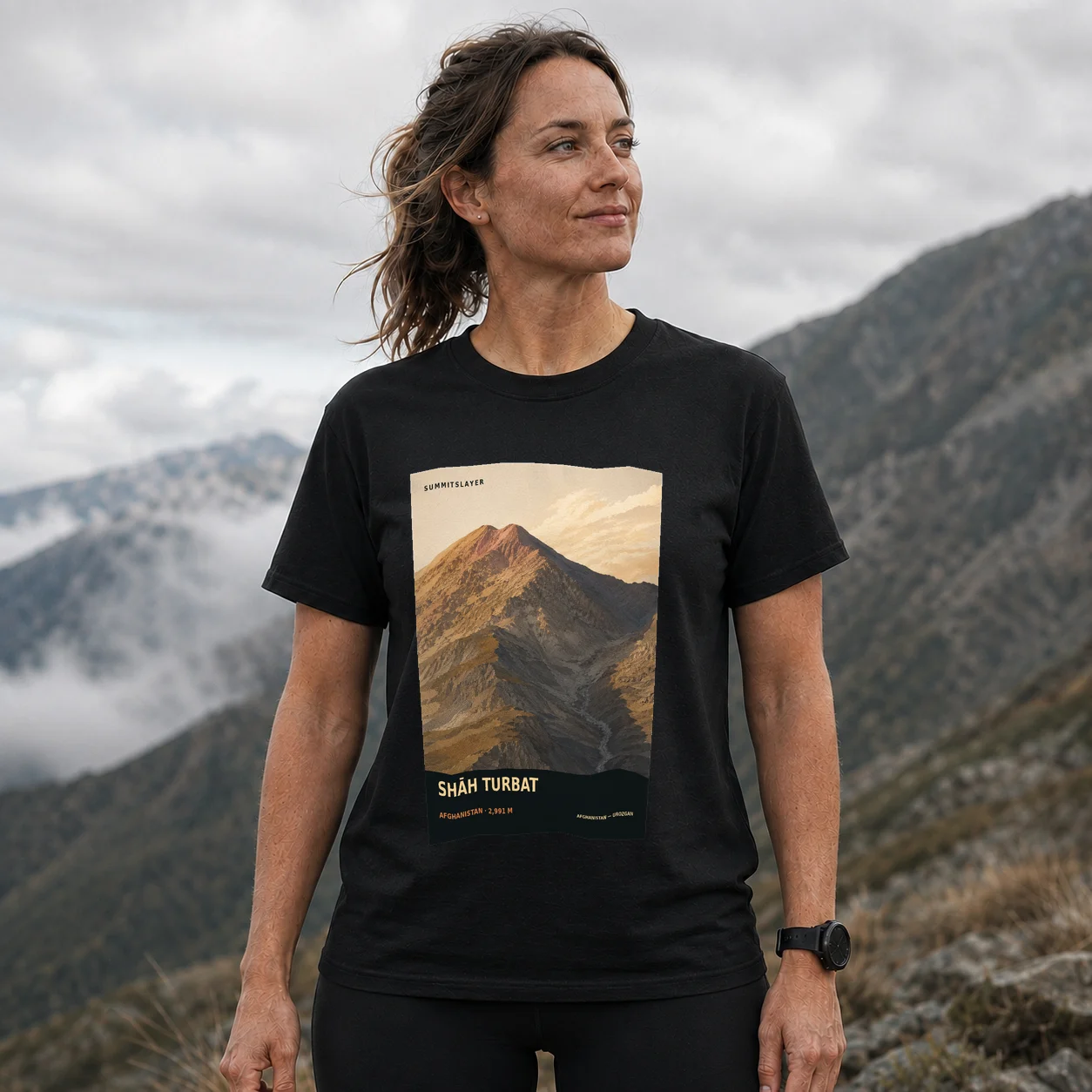 Black Shāh Turbat T-shirt front with mountain artwork