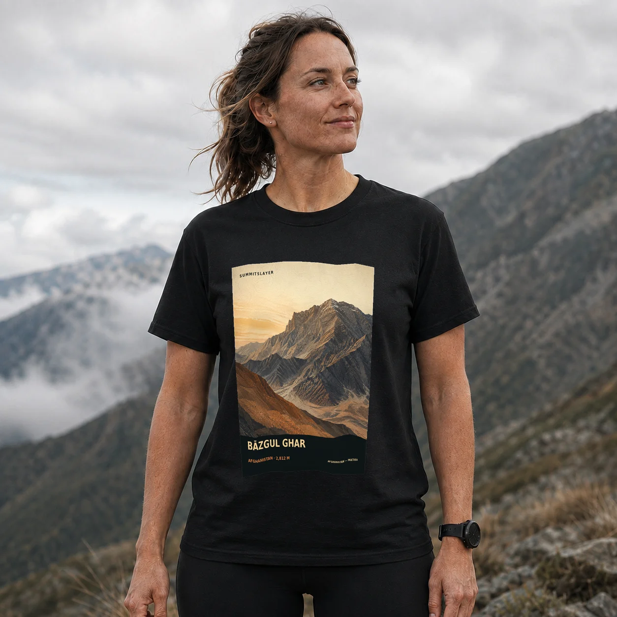Black BĀZGUL GHAR T-shirt front with mountain artwork