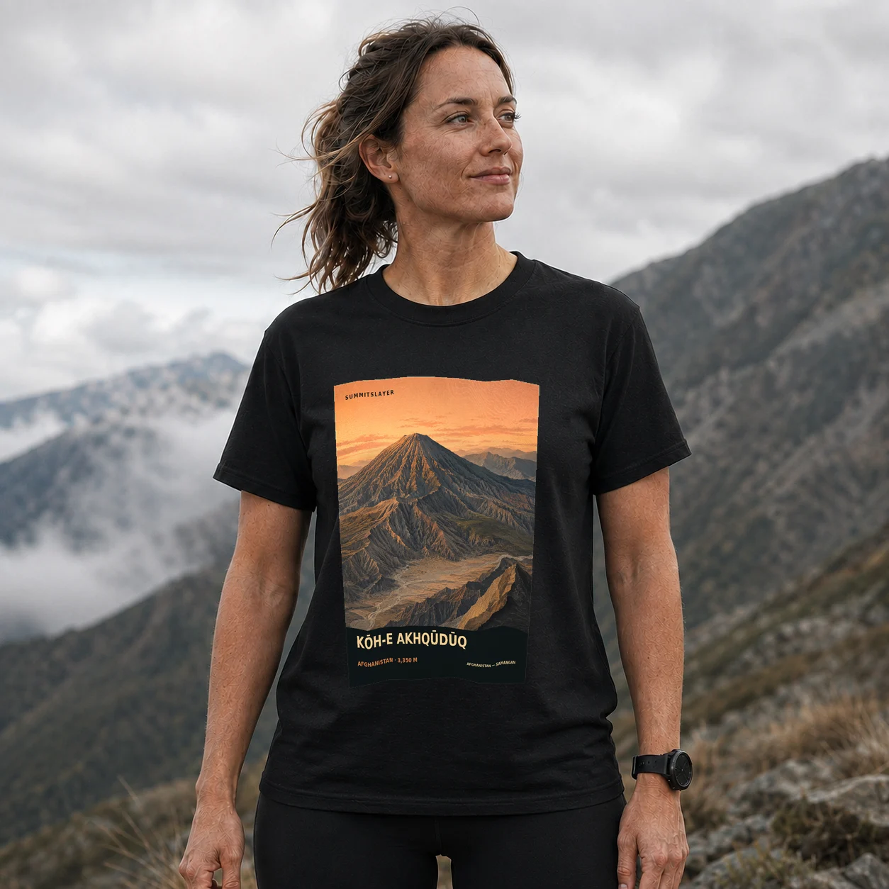 Black KŌH-E AKHQŪDŪQ T-shirt front with mountain artwork
