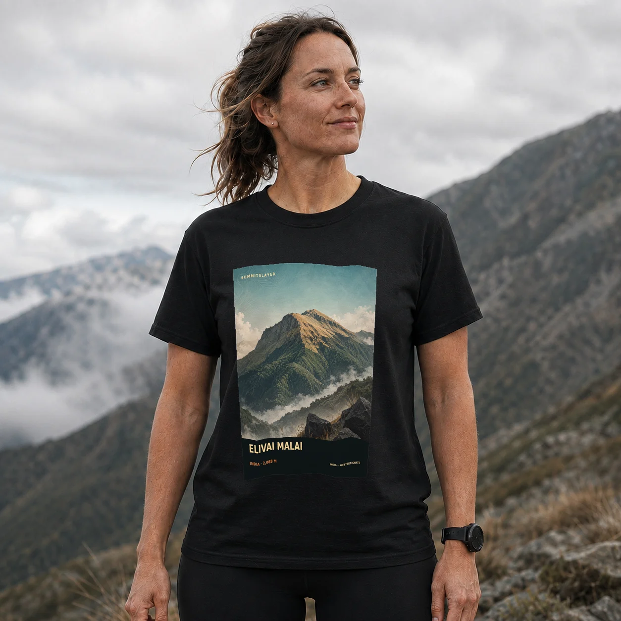 Black Elivāl Malai T-shirt front with mountain artwork