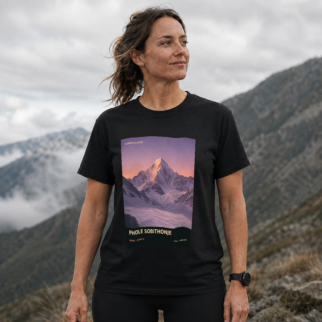 Black Pholesobi̇̄ Thoṅje T-shirt front with mountain artwork