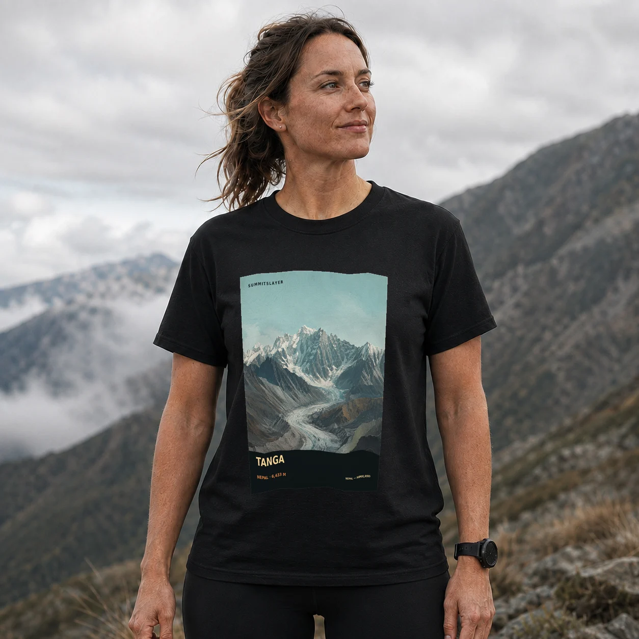 Black Tāṅgā T-shirt front with mountain artwork
