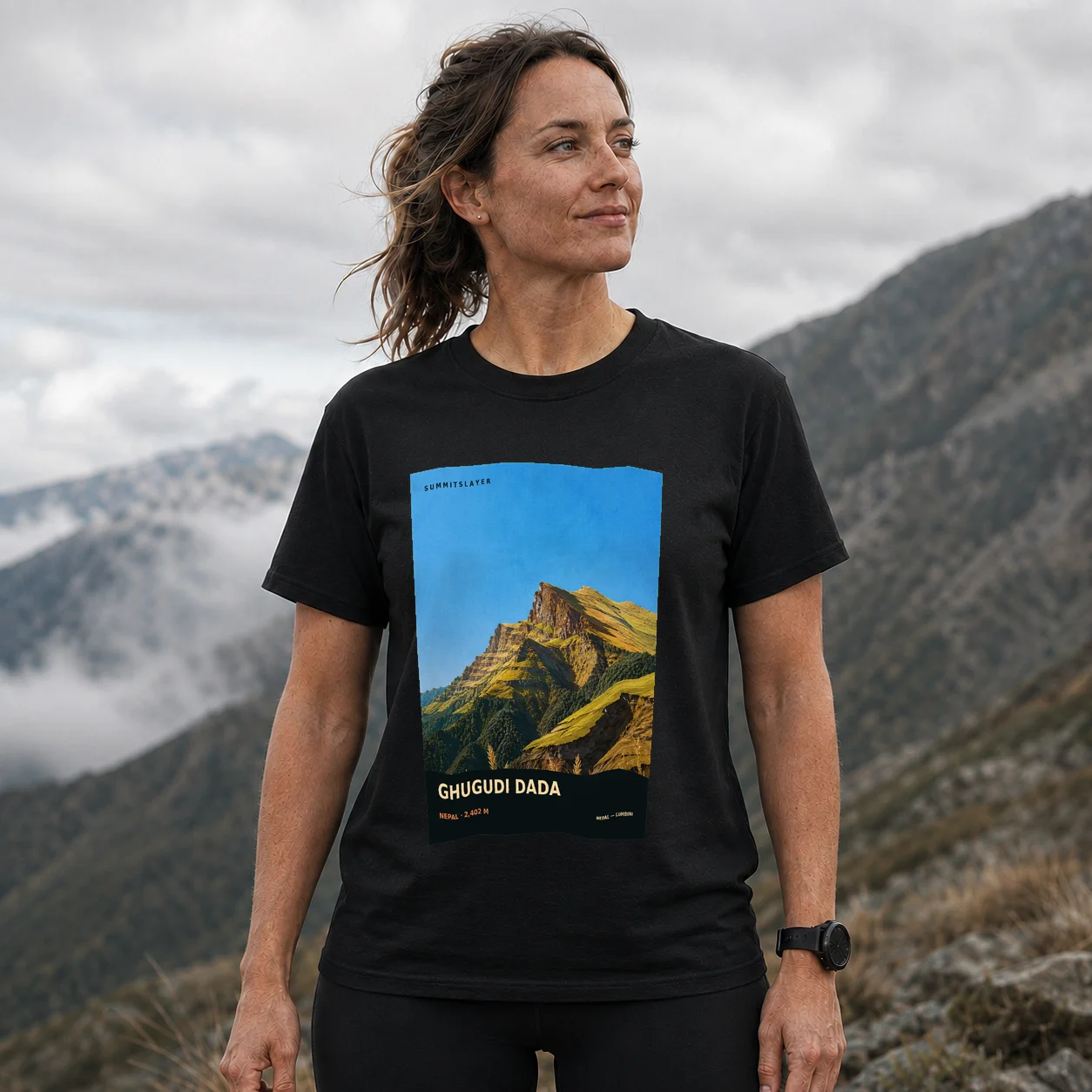 Black Ghuguḍi̇̄ Ḍā̃ḍā T-shirt front with mountain artwork