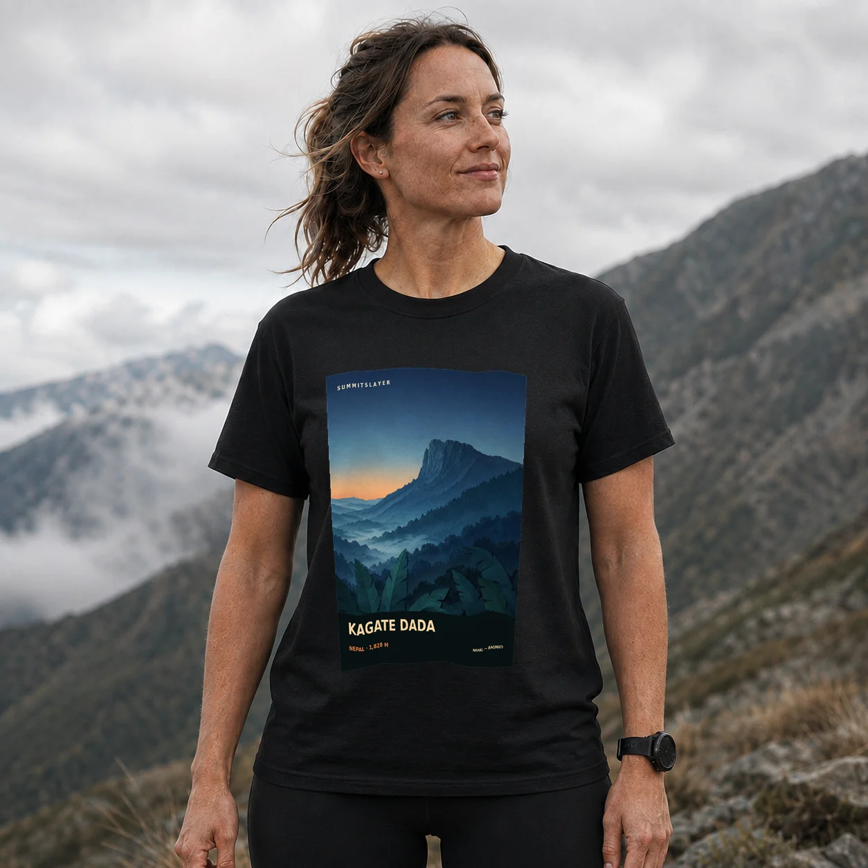Black Kāgate Ḍā̃ḍā T-shirt front with mountain artwork